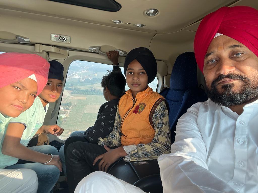 Punjab CM Charanjit Channi makes kids fly with him in chopper