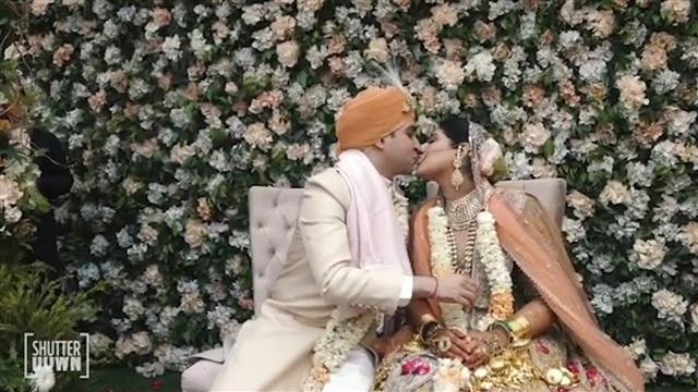 You may kiss the bride: Watch out the Hindi version of desi couple sharing a kiss after groom's dad, priest make this request