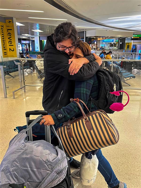 Emotions run high as Indian families, friends reunite after US opens travel