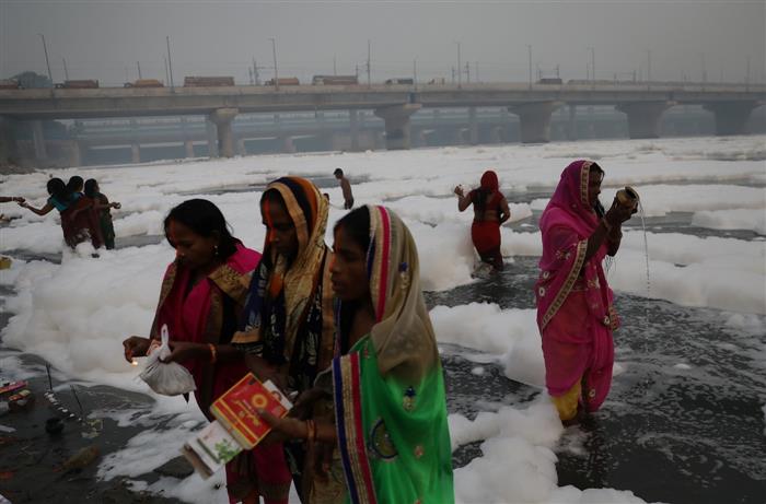 Police disperse crowd thronging Yamuna Ghat for Chhath Puja