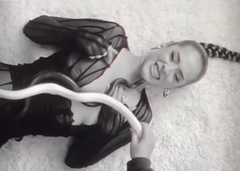 Watch: Shooting a music video with snakes, pop singer Maeta seen smiling before one of them crawled up her chin and bit her