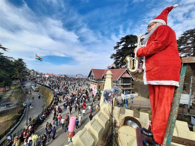 Pictures: No 'white' Christmas in Shimla, but excited holidaymakers have bags packed for New Year