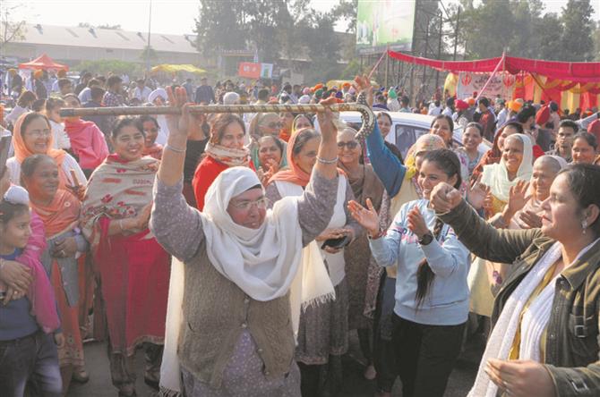 Women add colour to victory procession