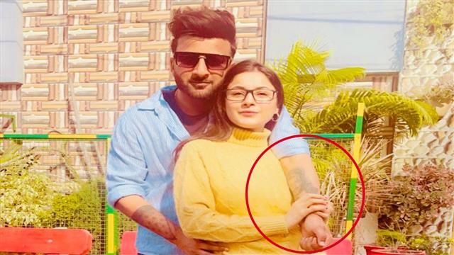 Shehnaaz Gill holds on to tattoo of Sidharth Shukla as she poses with brother Shehbaz Badesha, see photos