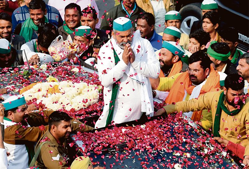 Tears, joy as Rakesh Tikait leads hordes of supporters back home after 383 days