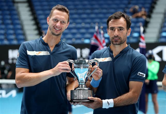 Dodig, Polasek win Australian Open men’s doubles title