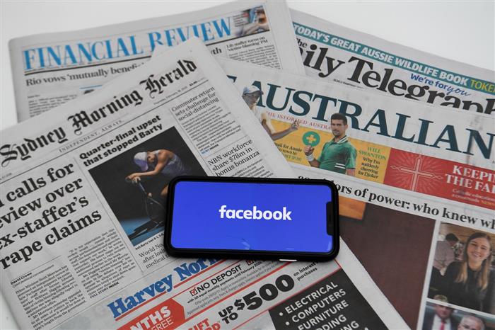 Australia passes law to make Google, Facebook pay for news