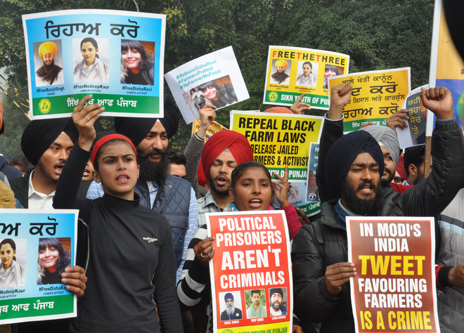 GNDU students demand release of jailed activists Nodeep Kaur and Disha Ravi