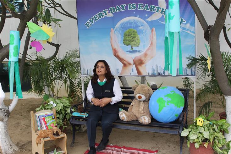 Students take ‘green pledge’ to mark Earth Day