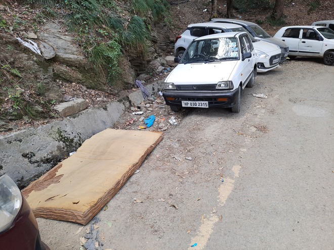Goods dumped on Sanjauli-IGMC road
