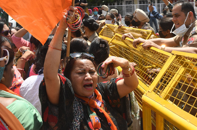 BJP Mahila Morcha activists protest against Punjab Govt