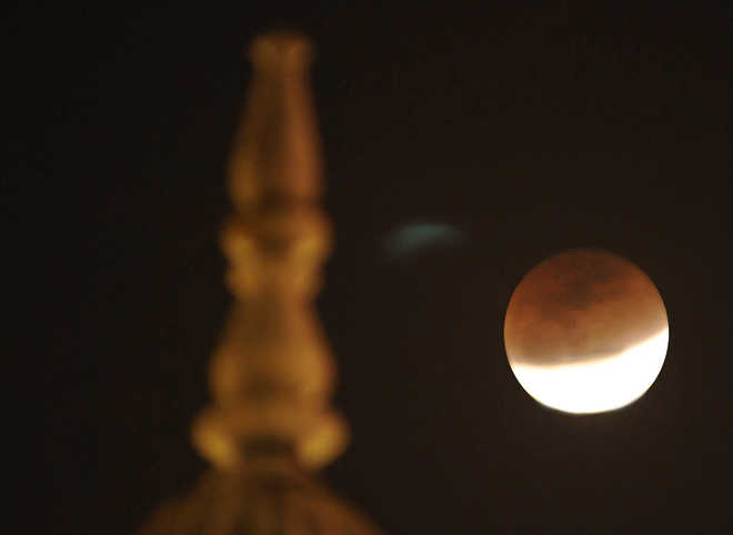 Supermoon! Red blood lunar eclipse! It's all happening at once, but what does that mean?