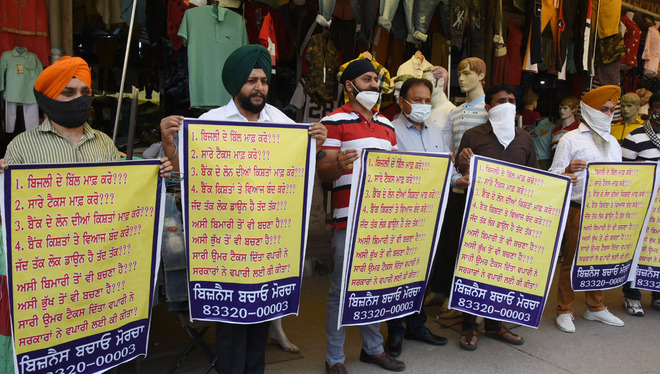 Traders start poster drive to press for demands