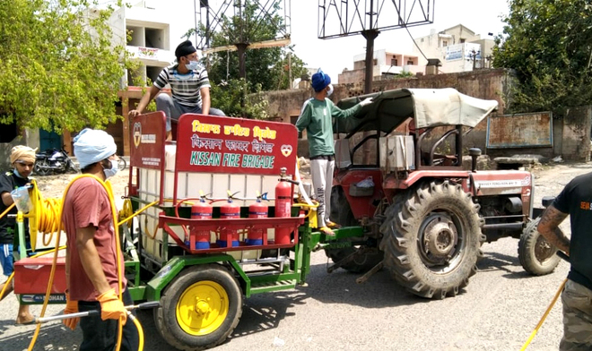 Farmers bring machines from Punjab to sanitise protest sites