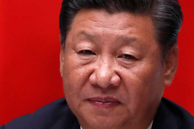 President Xi asks Chinese media, diplomats to tone down aggressive approach