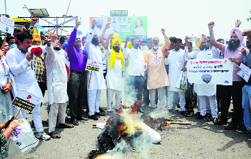 AAP demands action against Dharmsot