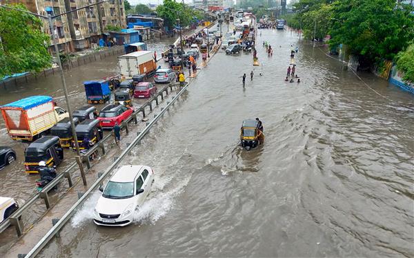 Heavy rain lash Mumbai; train, bus services hit due to water-logging