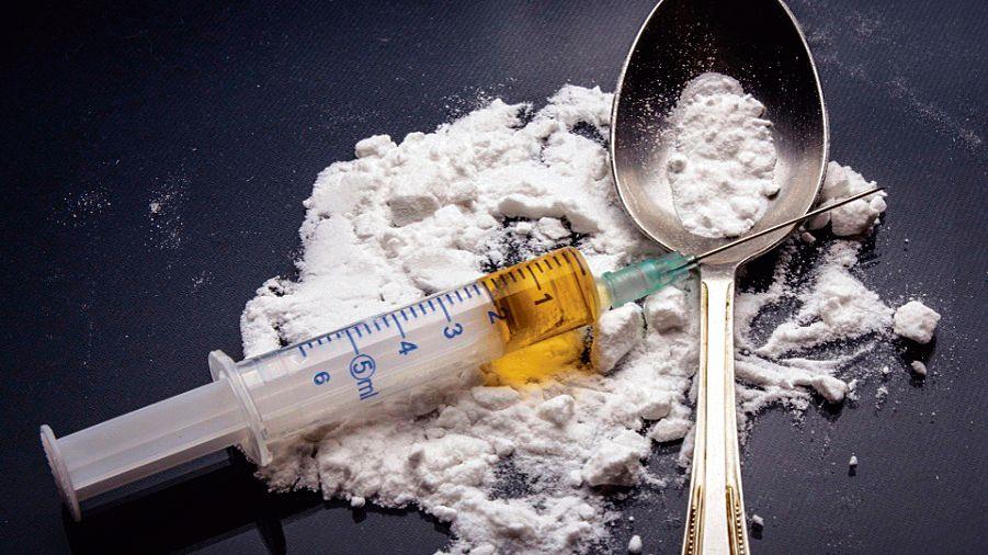 2 drug peddlers held with 50-gm opium, intoxicants