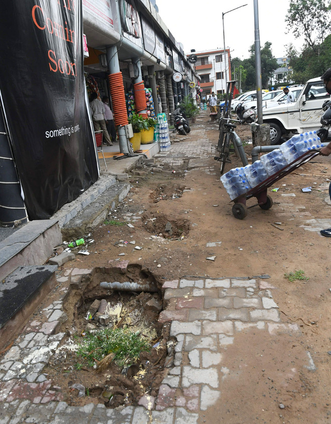 Dug-up pathways irk Sector 8 traders