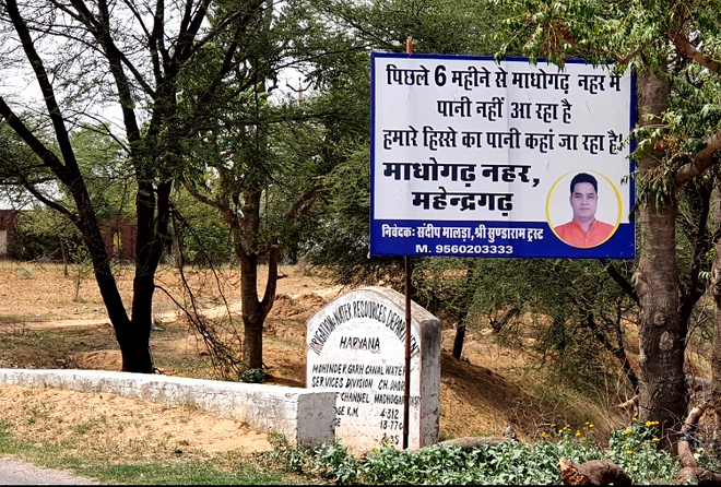 Hoardings put up to highlight canal water shortage in Mahendragarh