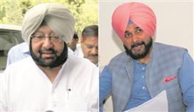 Sidhu to skip AICC panel meet, Rahul reaches out to dissidents