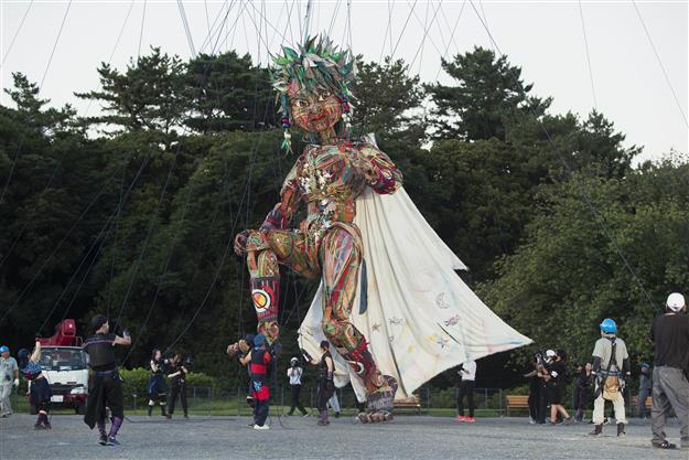 Giant Olympic puppet arrives in Tokyo