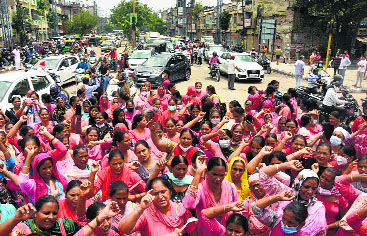 ASHA workers protest, seek Rs15K salary, smartphones