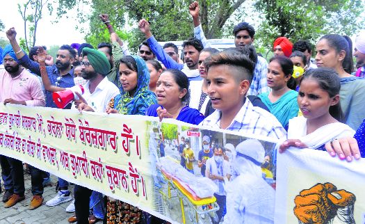 Frontline workers hold protest march from Gurdwara Dukhniwaran Sahib to the Fountain Chowk in Patiala
