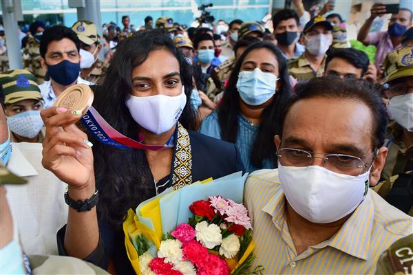 After winning bronze at Tokyo Olympics, PV Sindhu returns to warm reception