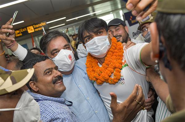 Sweets from mother await Neeraj Chopra on arrival in India