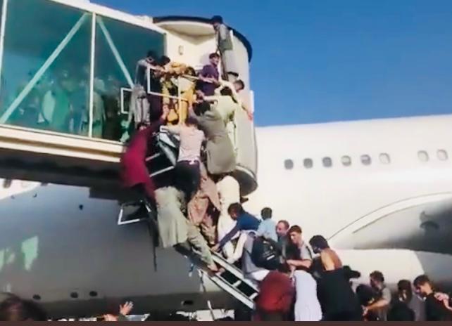 Chaos at Kabul airport as hundreds try to leave; viral videos show people falling to their death from US aircraft