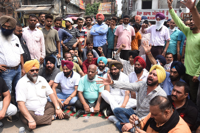 Shop owners, councillor hold protest at Mochpura Bazaar