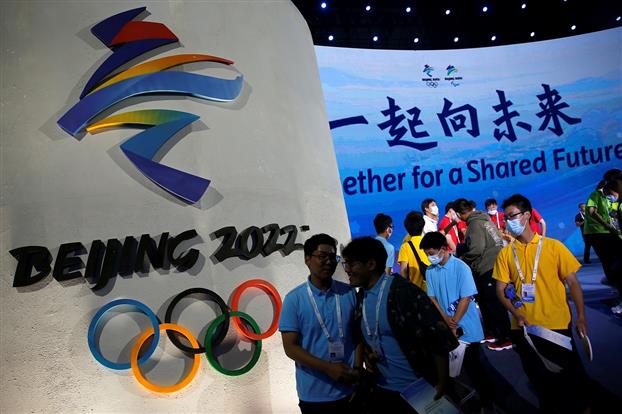 IOC urges Olympic teams to ask for Chinese vaccines