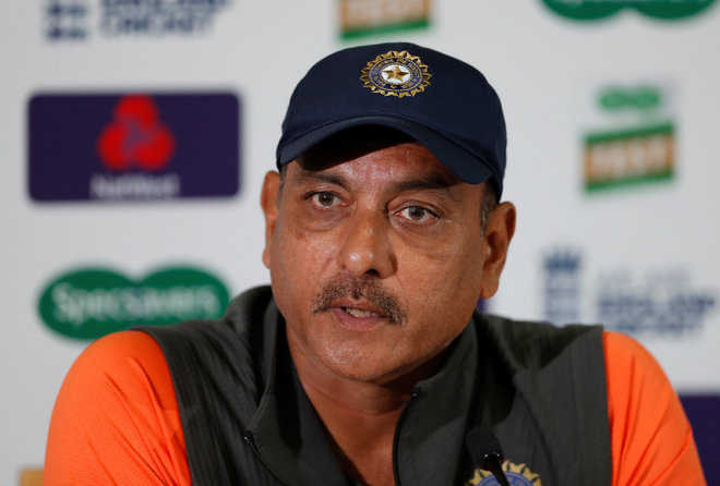 Shastri, Arun, Sridhar awaiting ‘fit to fly’ certificate in order to return home: BCCI official