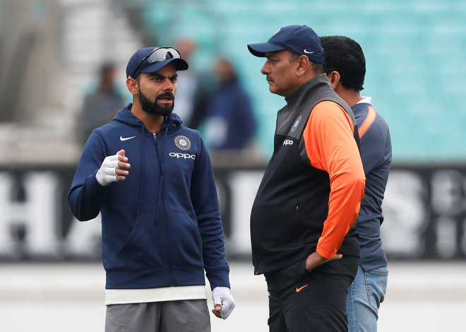 India head coach Ravi Shastri and skipper Virat Kohli trolled over book launch event as 5th Test cancelled over Covid-19 fears