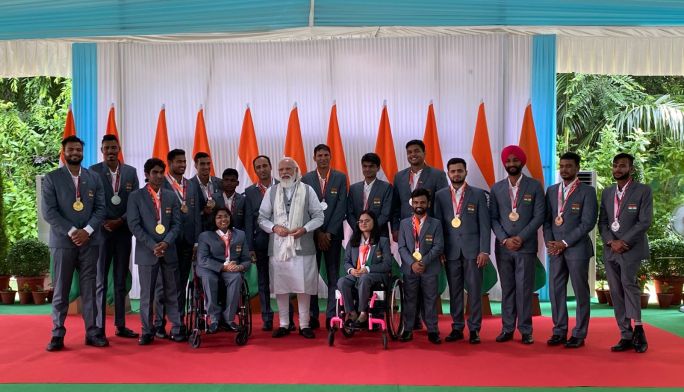 Modi hosts India Paralympic contingent, presented with autographed stole