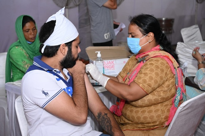 300 vaccinated at college camp