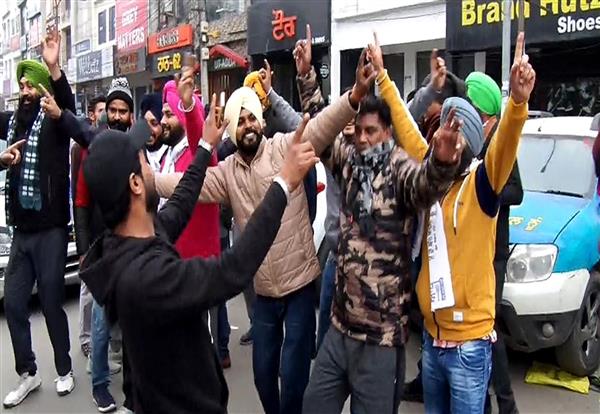 Amritsar workers celebrate after AAP picks Bhagwant Mann as CM candidate