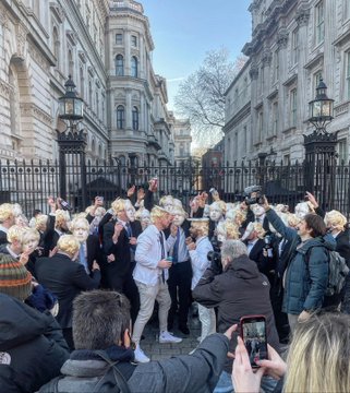 Watch: With wine and beer bottles, 100 people dressed as UK PM Boris Johnson party outside London’s Downing Street