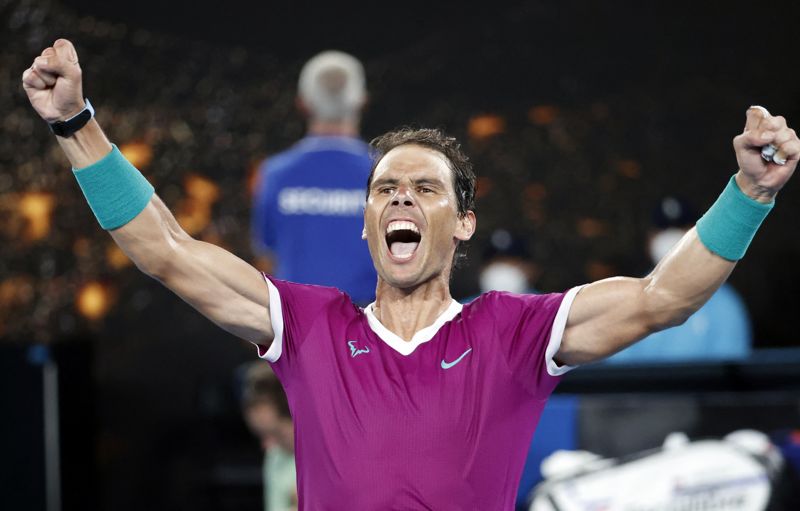 Rafael Nadal comes back from two sets down to claim 21st Major