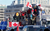 Thousands protest Covid mandates and restrictions in Canadian capital