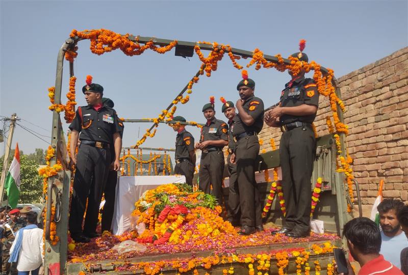 Major killed in chopper crash cremated with state honours in in Hanumangarh village