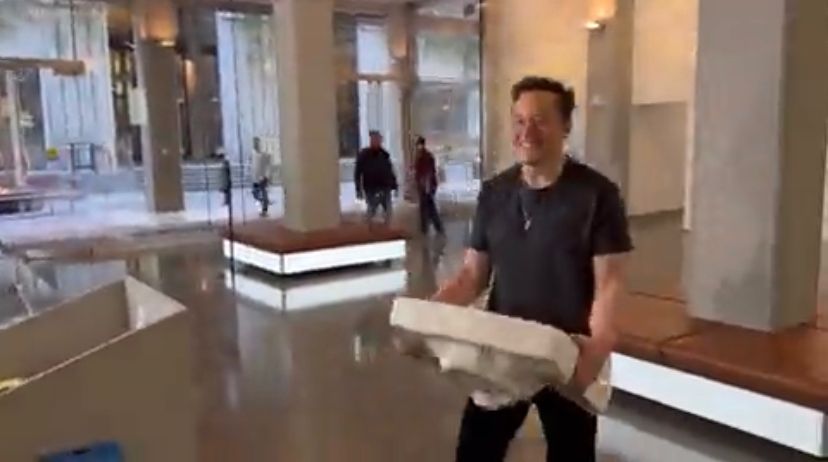 Elon Musk tweets video of him walking into Twitter headquarters with a sink, updates bio