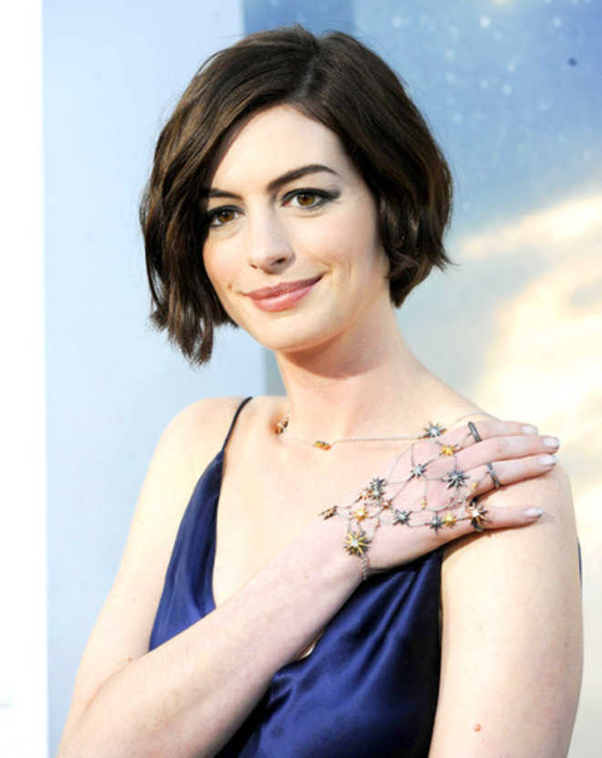 Anne Hathaway explain how motherhood influences her selection of roles