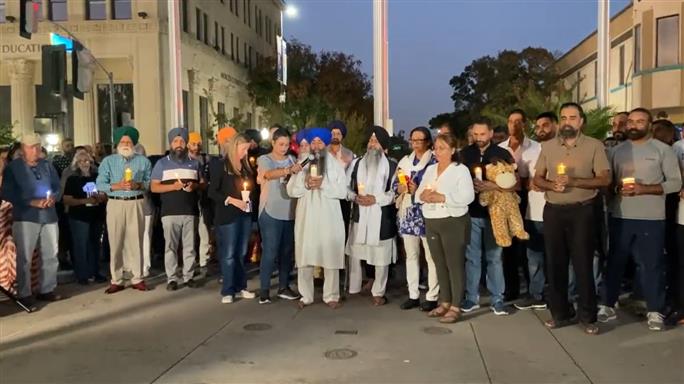 'We're all shattered': Loved ones, community hold vigil for slain Sikh family in US