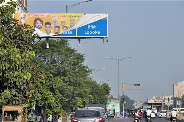 Illegal hoardings cover road signages in Amritsar