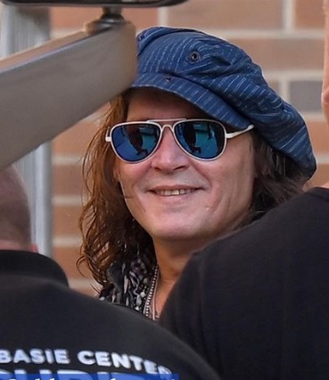 Johnny Depp looks almost unrecognisable in new-clean-shaven look