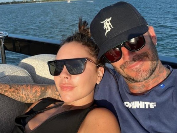 Victoria Beckham dismisses rumours of marriage trouble after removing tattoo  of David's initials | The US Sun