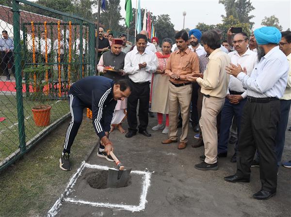 Chandigarh Adviser Dharam Pal lays stone for synthetic athletics track