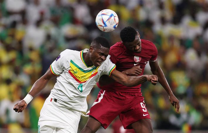 Hosts Qatar on brink of FIFA World Cup elimination after 3-1 loss to Senegal